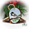 A hand-painted Carolina chickadee on a wood slice Christmas ornament available for purchase at Cove Creek Photography.
